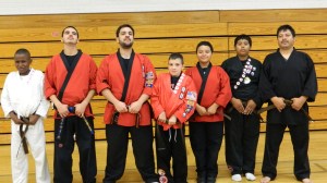 BJJ Pose: Alan, Cris, Isaiah, Jayden, and Jesus with their new Brown Belts